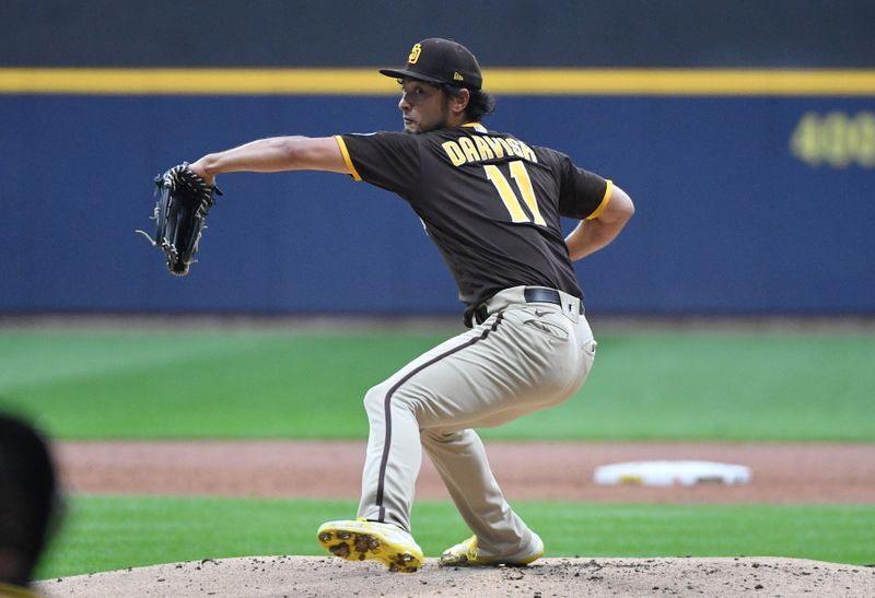 Aug 25, 2023; Milwaukee, Wisconsin, USA; San Diego Padres starting pitcher Yu Darvish (11) delivers a pitch against the Milwaukee Brewers in the first inning at American Family Field. Mandatory Credit: Michael McLoone-USA TODAY Sports