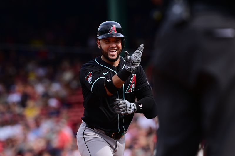 Aug 25, 2024; Boston, Massachusetts, USA; Arizona Diamondbacks third baseman Eugenio Suarez (28) reacts to his three run home run against the Boston Red Sox during the sixth inning at Fenway Park. Mandatory Credit: Eric Canha-USA TODAY Sports