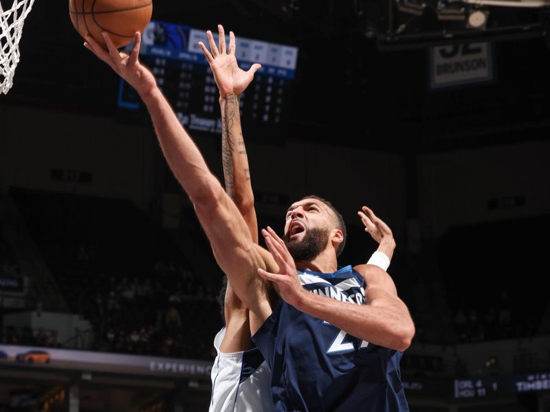 MINNEAPOLIS, MN -  DECEMBER 21: Rudy Gobert #27 of the Minnesota Timberwolves drives to the basket during the game against the Dallas Mavericks on December 21, 2022 at Target Center in Minneapolis, Minnesota. NOTE TO USER: User expressly acknowledges and agrees that, by downloading and or using this Photograph, user is consenting to the terms and conditions of the Getty Images License Agreement. Mandatory Copyright Notice: Copyright 2022 NBAE (Photo by David Sherman/NBAE via Getty Images)