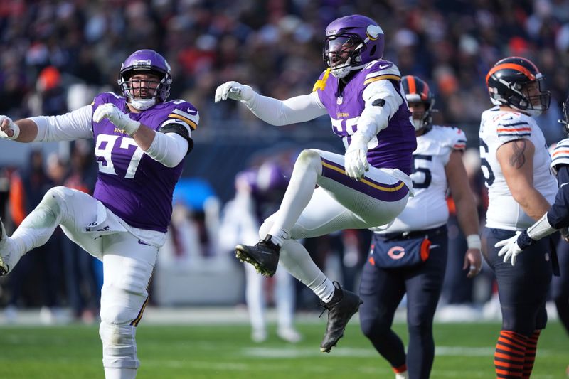 Minnesota Vikings linebacker Jonathan Greenard (58) celebrates after sacking Chicago Bears quarterback Caleb Williams during the first half of an NFL football game Sunday, Nov. 24, 2024, in Chicago. (AP Photo/Charles Rex Arbogast)