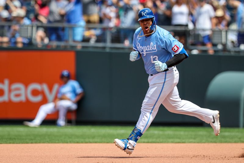 Jun 30, 2024; Kansas City, Missouri, USA; Kansas City Royals catcher Salvador Perez (13) reacts after hitting a home run during the seventh inning against the Cleveland Guardians at Kauffman Stadium. Mandatory Credit: William Purnell-USA TODAY Sports