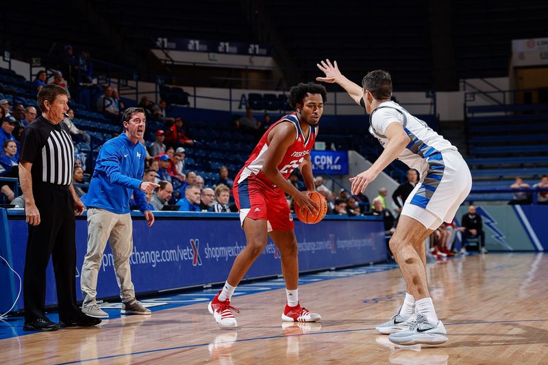 Feb 21, 2023; Colorado Springs, Colorado, USA; Fresno State Bulldogs guard Anthony Holland (25) controls the ball as ]Air Force Falcons forward Beau Becker (14) guards in the first half at Clune Arena. Mandatory Credit: Isaiah J. Downing-USA TODAY Sports