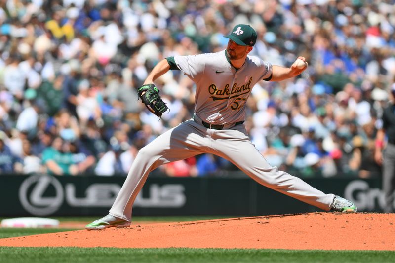 May 12, 2024; Seattle, Washington, USA; Oakland Athletics starting pitcher Alex Wood (57) pitches to the Seattle Mariners during the first inning at T-Mobile Park. Mandatory Credit: Steven Bisig-USA TODAY Sports