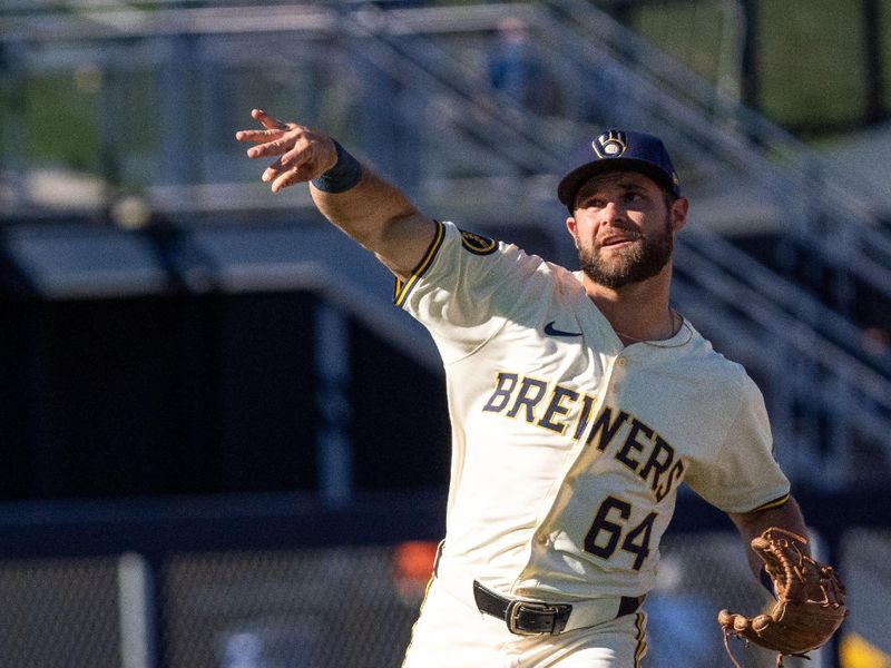 Mar 2, 2024; Phoenix, Arizona, USA; Milwaukee Brewers infielder Vinny Capra (64) throws the ball to first in the eighth during a spring training game against the Los Angeles Dodgers at American Family Fields of Phoenix. Mandatory Credit: Allan Henry-USA TODAY Sports