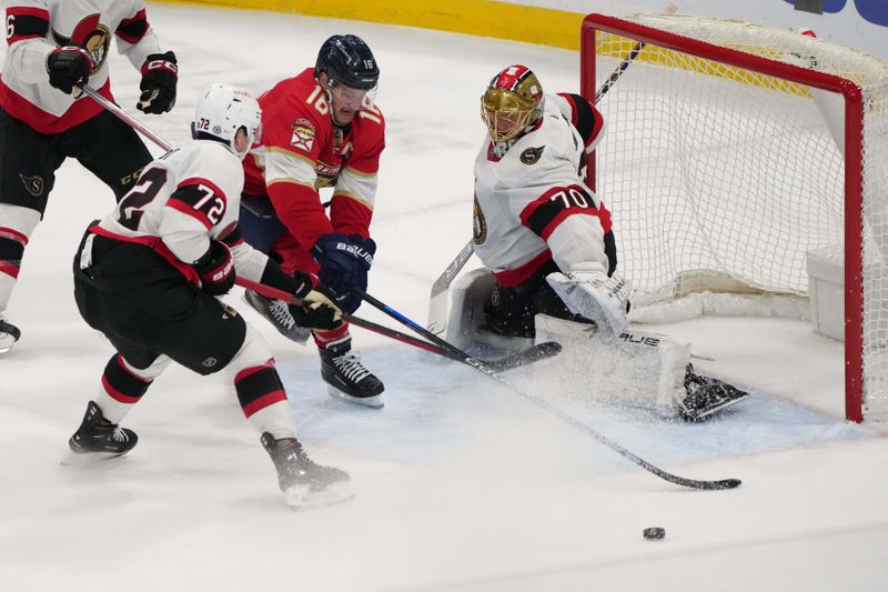 Feb 20, 2024; Sunrise, Florida, USA; Florida Panthers center Aleksander Barkov (16) tries to get a shot off as Ottawa Senators goaltender Joonas Korpisalo (70) and defenseman Thomas Chabot (72) defend on the play during the second period at Amerant Bank Arena. Mandatory Credit: Jim Rassol-USA TODAY Sports