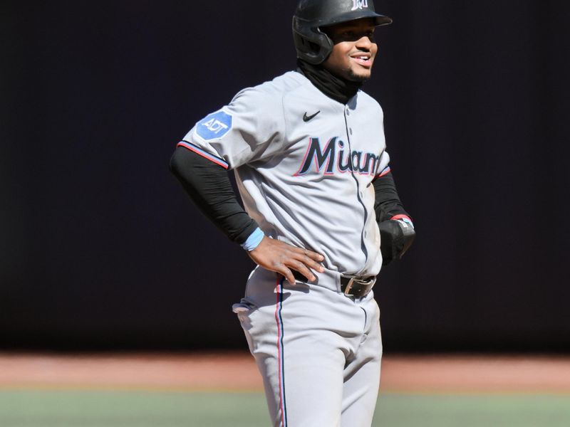 Apr 9, 2025; New York City, New York, USA; Miami Marlins shortstop Xavier Edwards (9) reacts after reaching second base on a passed ball by New York Mets pitcher Edwin Diaz (not pictured) during the ninth inning at Citi Field. Mandatory Credit: John Jones-Imagn Images