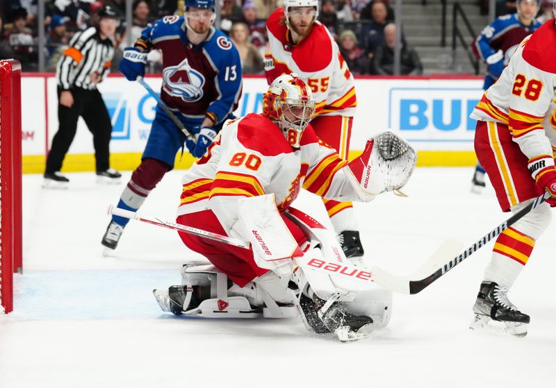 Dec 11, 2023; Denver, Colorado, USA; Calgary Flames goaltender Dan Vladar (80) defends the net in the second period against the Colorado Avalanche at Ball Arena. Mandatory Credit: Ron Chenoy-USA TODAY Sports