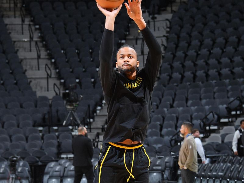 SAN ANTONIO, TX - MARCH 31: Moses Moody #4 of the Golden State Warriors warms up before the game against the San Antonio Spurs on March 31, 2024 at the Frost Bank Center in San Antonio, Texas. NOTE TO USER: User expressly acknowledges and agrees that, by downloading and or using this photograph, user is consenting to the terms and conditions of the Getty Images License Agreement. Mandatory Copyright Notice: Copyright 2024 NBAE (Photos by Michael Gonzales/NBAE via Getty Images)