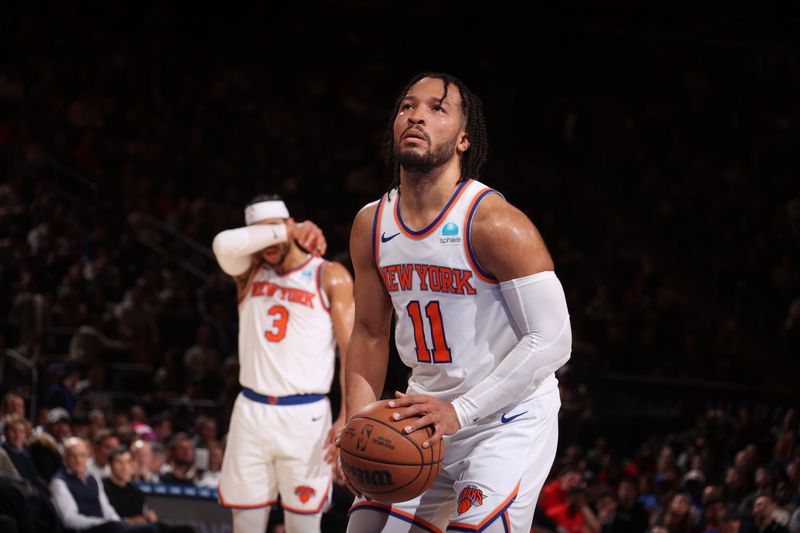 NEW YORK, NY - JANUARY 17: Jalen Brunson #11 of the New York Knicks shoots a free throw during the game against the Houston Rockets on January 17, 2024 at Madison Square Garden in New York City, New York.  NOTE TO USER: User expressly acknowledges and agrees that, by downloading and or using this photograph, User is consenting to the terms and conditions of the Getty Images License Agreement. Mandatory Copyright Notice: Copyright 2024 NBAE  (Photo by Nathaniel S. Butler/NBAE via Getty Images)