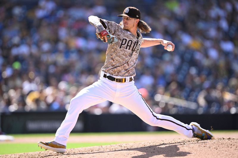 Jul 30, 2023; San Diego, California, USA; San Diego Padres relief pitcher Josh Hader (71) throws a pitch against the Texas Rangers during the ninth inning at Petco Park. Mandatory Credit: Orlando Ramirez-USA TODAY Sports