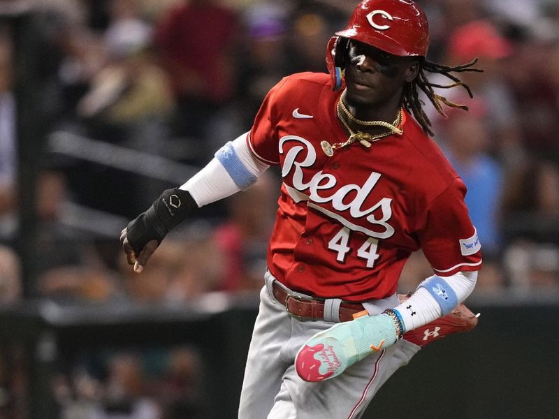 Aug 26, 2023; Phoenix, Arizona, USA; Cincinnati Reds third baseman Elly De La Cruz (44) scores a run against the Arizona Diamondbacks during the tenth inning at Chase Field. Mandatory Credit: Joe Camporeale-USA TODAY Sports