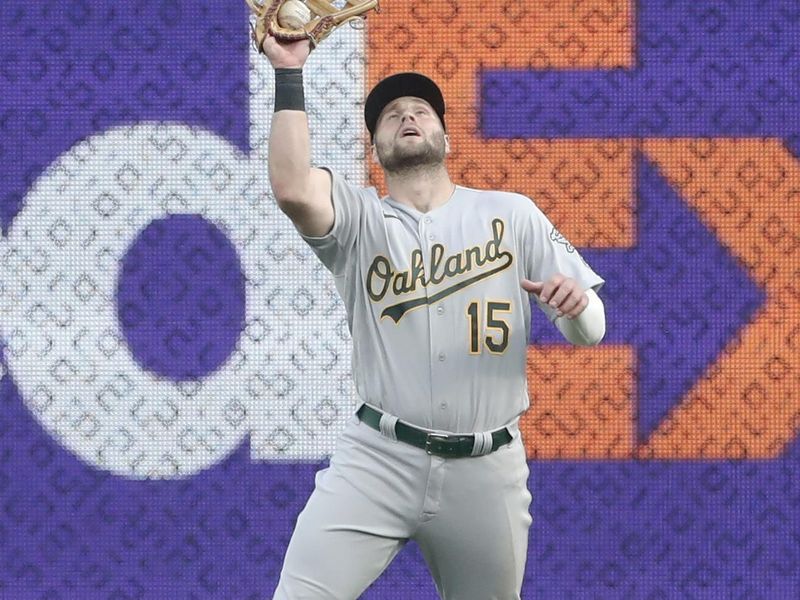 Jun 6, 2023; Pittsburgh, Pennsylvania, USA; Oakland Athletics right fielder Seth Brown (15) makes a catch for an out during the third inning at PNC Park. Mandatory Credit: Charles LeClaire-USA TODAY Sports