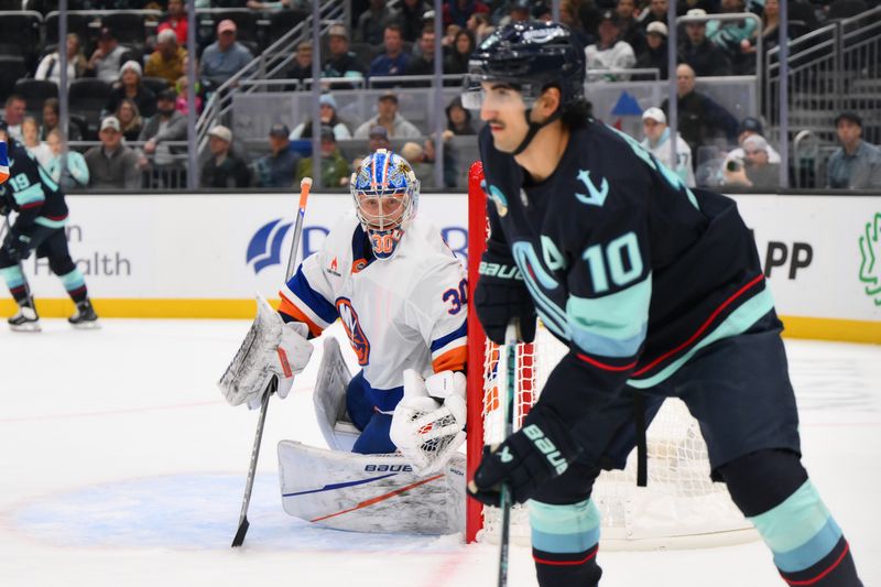 Nov 16, 2024; Seattle, Washington, USA; New York Islanders goaltender Ilya Sorokin (30) defends the goal against the Seattle Kraken during the third period at Climate Pledge Arena. Mandatory Credit: Steven Bisig-Imagn Images