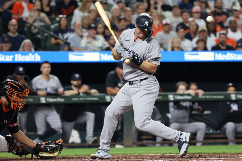 Sep 19, 2025; Baltimore, Maryland, USA; New York Yankees first baseman Paul Goldschmidt (48) is hit by a pitch during the third inning against the Baltimore Orioles at Oriole Park at Camden Yards. Mandatory Credit: Daniel Kucin Jr.-Imagn Images