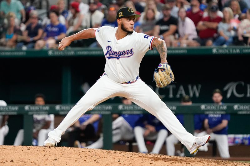 May 18, 2024; Arlington, Texas, USA; Texas Rangers relief pitcher Jonathan Hernandez (72) throws to the plate during the eighth inning against the Los Angeles Angels at Globe Life Field. Mandatory Credit: Raymond Carlin III-USA TODAY Sports