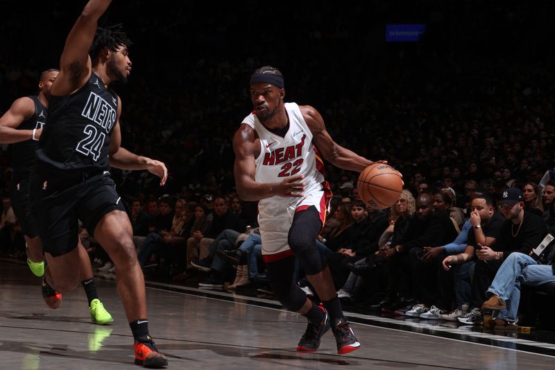 BROOKLYN, NY - JANUARY 15: Jimmy Butler #22 of the Miami Heat drives to the basket during the game against the Brooklyn Nets on January 15, 2024 at Barclays Center in Brooklyn, New York. NOTE TO USER: User expressly acknowledges and agrees that, by downloading and or using this Photograph, user is consenting to the terms and conditions of the Getty Images License Agreement. Mandatory Copyright Notice: Copyright 2024 NBAE (Photo by Nathaniel S. Butler/NBAE via Getty Images)