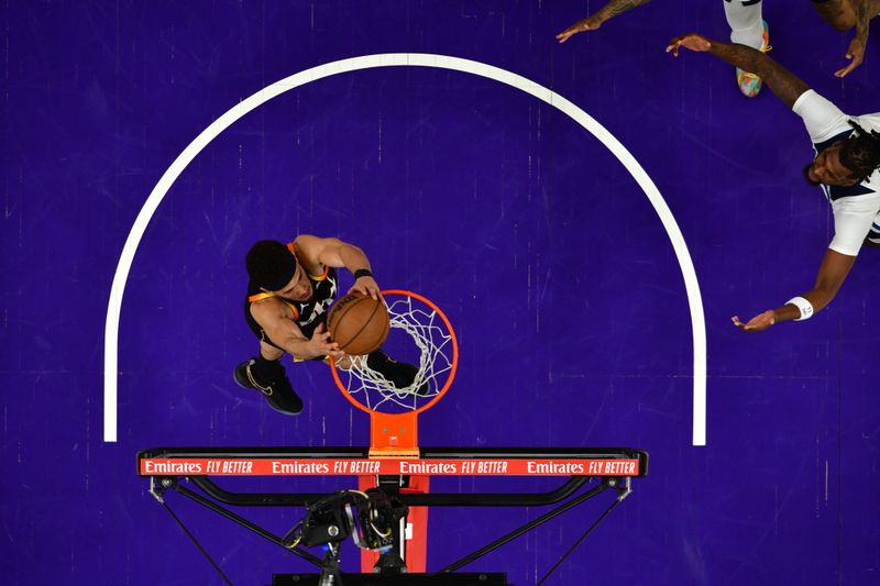 PHOENIX, AZ - APRIL  28: Devin Booker #1 of the Phoenix Suns dunks the ball during the game against the Minnesota Timberwolves during Round 1 Game 4 of the 2024 NBA Playoffs on April 28, 2024 at Footprint Center in Phoenix, Arizona. NOTE TO USER: User expressly acknowledges and agrees that, by downloading and or using this photograph, user is consenting to the terms and conditions of the Getty Images License Agreement. Mandatory Copyright Notice: Copyright 2024 NBAE (Photo by Kate Frese/NBAE via Getty Images)