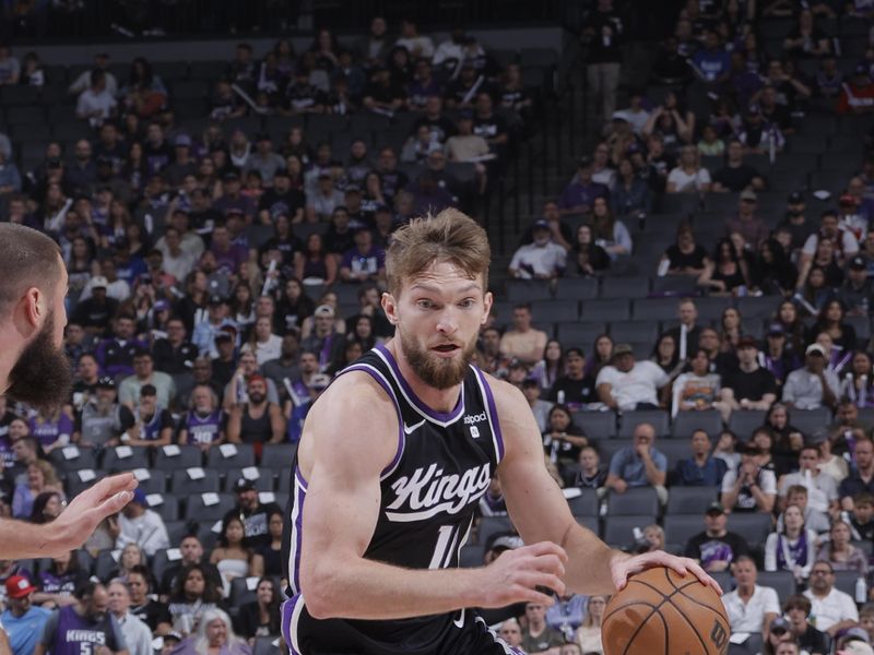 SACRAMENTO, CA - APRIL 11: Domantas Sabonis #10 of the Sacramento Kings dribbles the ball during the game against the New Orleans Pelicans on April 11, 2024 at Golden 1 Center in Sacramento, California. NOTE TO USER: User expressly acknowledges and agrees that, by downloading and or using this Photograph, user is consenting to the terms and conditions of the Getty Images License Agreement. Mandatory Copyright Notice: Copyright 2024 NBAE (Photo by Rocky Widner/NBAE via Getty Images)