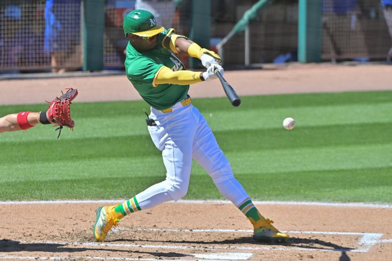 Mar 20, 2024; Mesa, Arizona, USA;  Oakland Athletics center fielder Esteury Ruiz (1) grounds out in the second inning against the Chicago Cubs during a spring training game at Hohokam Stadium. Mandatory Credit: Matt Kartozian-USA TODAY Sports