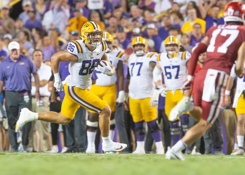 Sep 23, 2023; Baton Rouge, Louisiana, USA; LSU Tigers tight end Mason Taylor (86) runs the ball during the game against Arkansas Razorbacks at Tiger Stadium. Mandatory Credit: Scott Clause-USA TODAY Sports