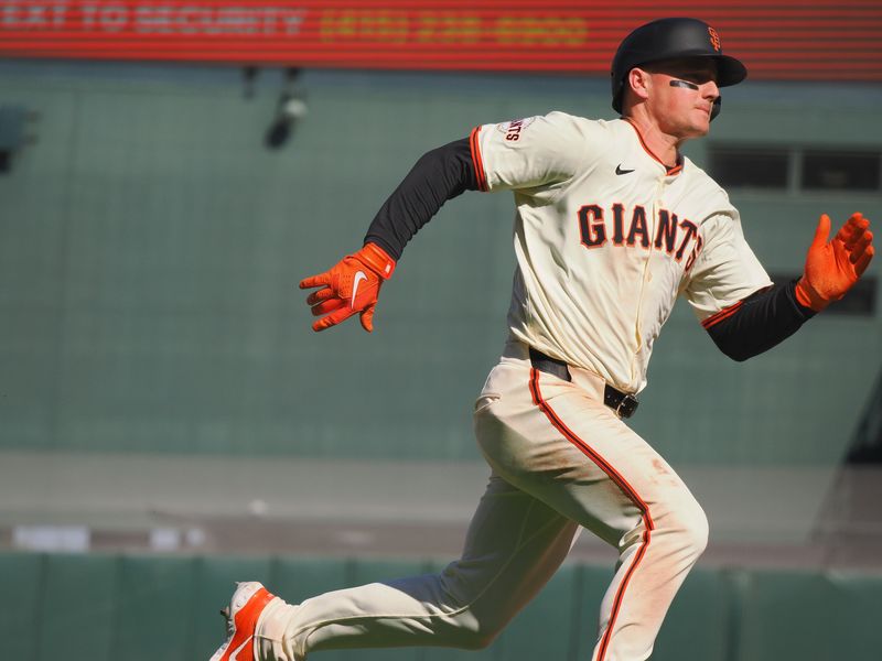 Apr 5, 2024; San Francisco, California, USA; San Francisco Giants third baseman Matt Chapman (26) scores a walk-off run against the San Diego Padres during the ninth inning at Oracle Park. Mandatory Credit: Kelley L Cox-USA TODAY Sports