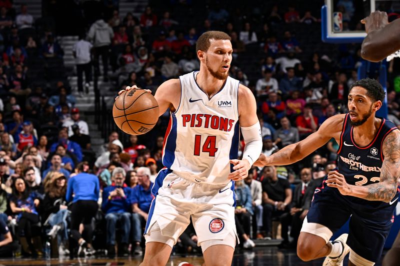 PHILADELPHIA, PA - APRIL 9: Malachi Flynn #14 of the Detroit Pistons dribbles the ball during the game against the Philadelphia 76ers on April 9, 2024 at the Wells Fargo Center in Philadelphia, Pennsylvania NOTE TO USER: User expressly acknowledges and agrees that, by downloading and/or using this Photograph, user is consenting to the terms and conditions of the Getty Images License Agreement. Mandatory Copyright Notice: Copyright 2024 NBAE (Photo by David Dow/NBAE via Getty Images)