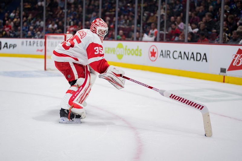 Feb 13, 2023; Vancouver, British Columbia, CAN; Detroit Red Wings goalie Ville Husso (35) handles the puck  against the Vancouver Canucks in the first period at Rogers Arena. Mandatory Credit: Bob Frid-USA TODAY Sports