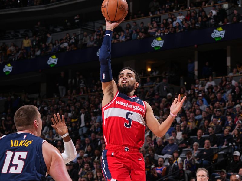 DENVER, CO - FEBRUARY 22: Tyus Jones #5 of the Washington Wizards shoots the ball during the game against the Denver Nuggets on February 22, 2024 at the Ball Arena in Denver, Colorado. NOTE TO USER: User expressly acknowledges and agrees that, by downloading and/or using this Photograph, user is consenting to the terms and conditions of the Getty Images License Agreement. Mandatory Copyright Notice: Copyright 2024 NBAE (Photo by Bart Young/NBAE via Getty Images)