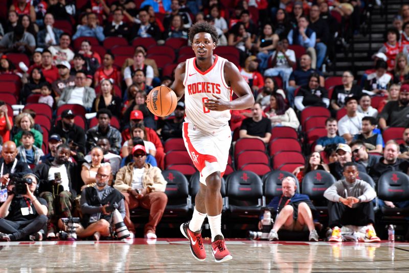 HOUSTON, TX - OCTOBER 17: Jae'Sean Tate #8 of the Houston Rockets brings the ball up court during the game against the San Antonio Spurs on October 17, 2024 at the Toyota Center in Houston, Texas. NOTE TO USER: User expressly acknowledges and agrees that, by downloading and or using this photograph, User is consenting to the terms and conditions of the Getty Images License Agreement. Mandatory Copyright Notice: Copyright 2024 NBAE (Photo by Logan Riely/NBAE via Getty Images)