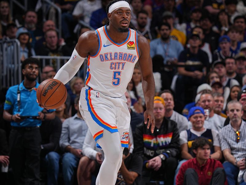 DENVER, CO - MAY 9: Luguentz Dort #5 of the Oklahoma City Thunder dribbles the ball during Round Two, Game Three of the 2025 NBA Playoffs on May 9, 2025 at Ball Arena in Denver, Colorado. NOTE TO USER: User expressly acknowledges and agrees that, by downloading and/or using this Photograph, user is consenting to the terms and conditions of the Getty Images License Agreement. Mandatory Copyright Notice: Copyright 2025 NBAE (Photo by Bart Young/NBAE via Getty Images)