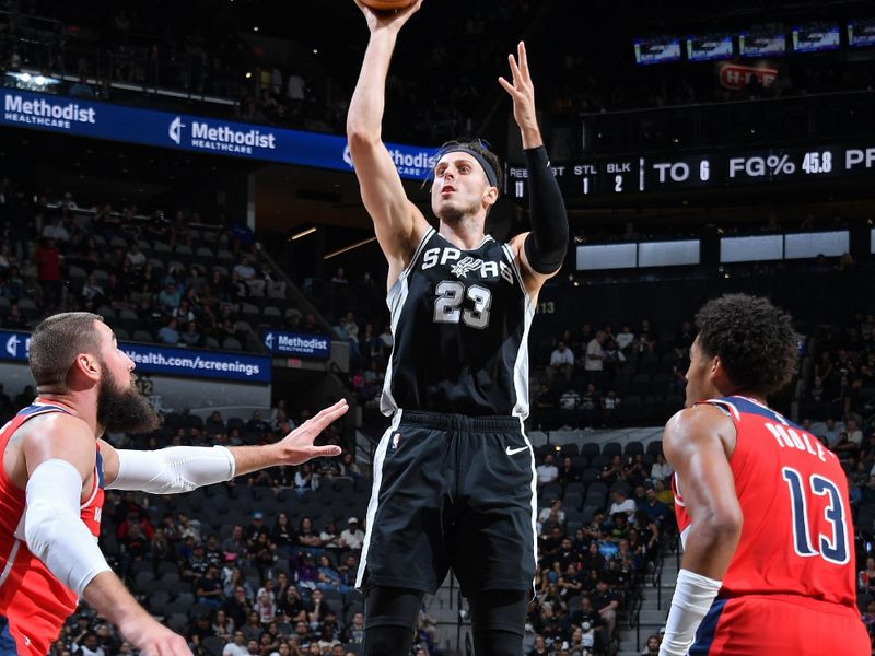 SAN ANTONIO, TX - NOVEMBER 13: Zach Collins #23 of the San Antonio Spurs shoots the ball during the game against the Washington Wizards on November 13, 2024 at the Frost Bank Center in San Antonio, Texas. NOTE TO USER: User expressly acknowledges and agrees that, by downloading and or using this photograph, user is consenting to the terms and conditions of the Getty Images License Agreement. Mandatory Copyright Notice: Copyright 2024 NBAE (Photos by Michael Gonzales/NBAE via Getty Images)