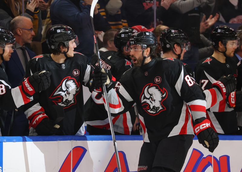 Mar 12, 2024; Buffalo, New York, USA;  Buffalo Sabres right wing Alex Tuch (89) celebrates his goal with teammates during the first period against the Detroit Red Wings at KeyBank Center. Mandatory Credit: Timothy T. Ludwig-USA TODAY Sports