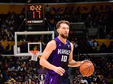 LOS ANGELES, CA - NOVEMBER 15: Domantas Sabonis #10 of the Sacramento Kings dribbles the ball during the game against the Los Angeles Lakers on November 15, 2023 at Crypto.Com Arena in Los Angeles, California. NOTE TO USER: User expressly acknowledges and agrees that, by downloading and/or using this Photograph, user is consenting to the terms and conditions of the Getty Images License Agreement. Mandatory Copyright Notice: Copyright 2023 NBAE (Photo by Adam Pantozzi/NBAE via Getty Images)