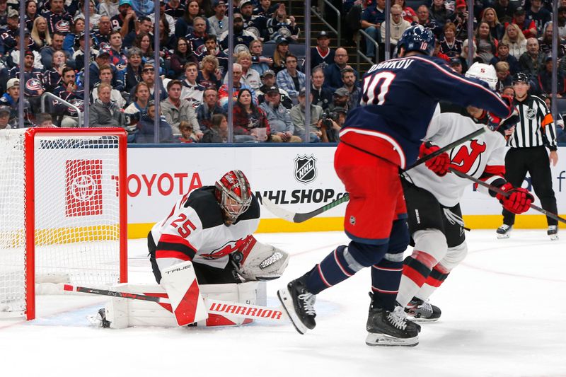 Oct 13, 2025; Columbus, Ohio, USA; New Jersey Devils goalie Jacob Markstrom (25) makes a save against the Columbus Blue Jackets during the third period at Nationwide Arena. Mandatory Credit: Russell LaBounty-Imagn Images