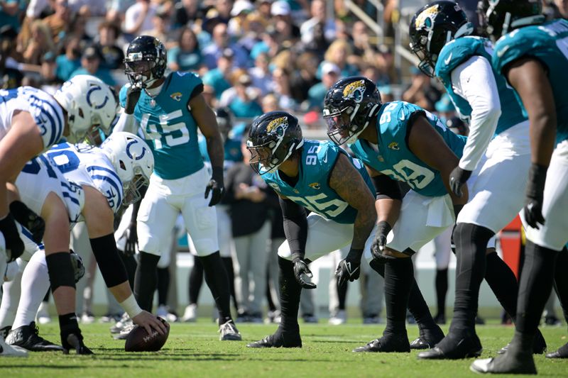 The Indianapolis Colts offense, left, lines up against the Jacksonville Jaguars defense during the second half of an NFL football game, Sunday, Oct. 15, 2023, in Jacksonville, Fla. (AP Photo/Phelan M. Ebenhack)