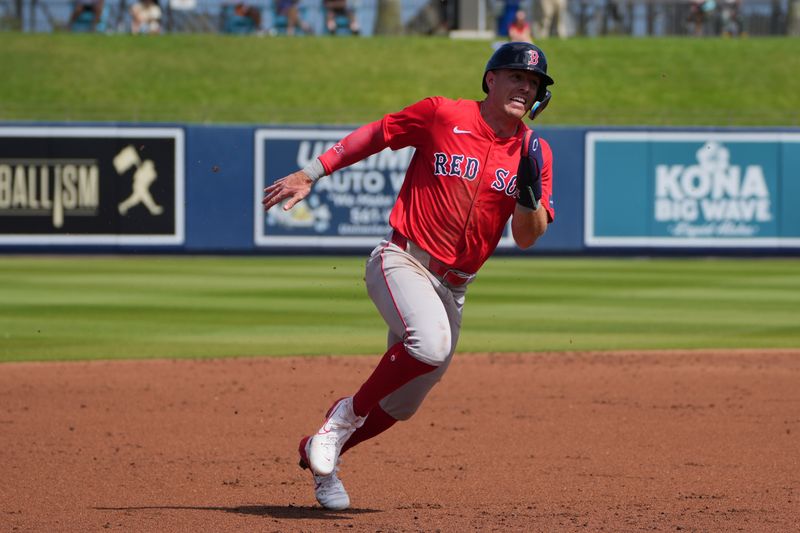 Feb 28, 2024; West Palm Beach, Florida, USA;  Boston Red Sox shortstop Romy Gonzalez (23) advances to third base on a base hit at The Ballpark of the Palm Beaches in the second inning. Mandatory Credit: Jim Rassol-USA TODAY Sports