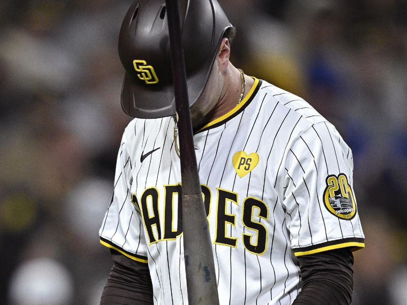 Apr 20, 2024; San Diego, California, USA; San Diego Padres center fielder Jackson Merrill (3) reacts after a strikeout during the eighth inning against the Toronto Blue Jays at Petco Park. Mandatory Credit: Orlando Ramirez-USA TODAY Sports