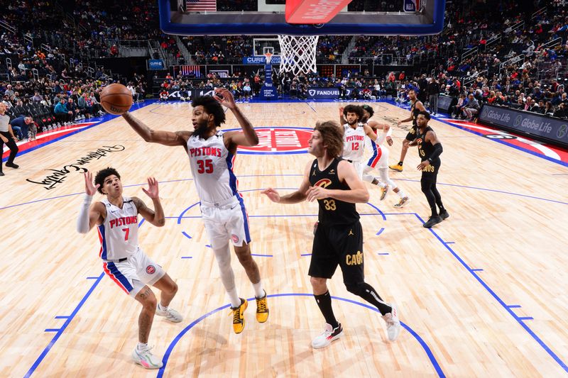 DETROIT, MI - NOVEMBER 27: Marvin Bagley III #35 of the Detroit Pistons grabs the rebound during the game against the Cleveland Cavaliers on November 27, 2022 at Little Caesars Arena in Detroit, Michigan. NOTE TO USER: User expressly acknowledges and agrees that, by downloading and/or using this photograph, User is consenting to the terms and conditions of the Getty Images License Agreement. Mandatory Copyright Notice: Copyright 2022 NBAE (Photo by Chris Schwegler/NBAE via Getty Images)