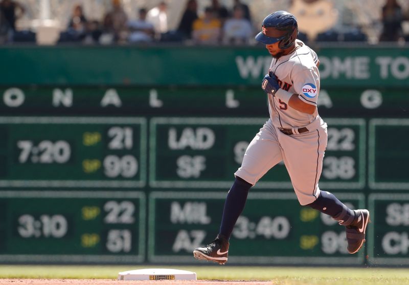 Apr 12, 2023; Pittsburgh, Pennsylvania, USA;  Houston Astros left fielder Corey Julks (9) circles the bases on his first career MLB home run against the Pittsburgh Pirates during the fourth inning at PNC Park. Mandatory Credit: Charles LeClaire-USA TODAY Sports