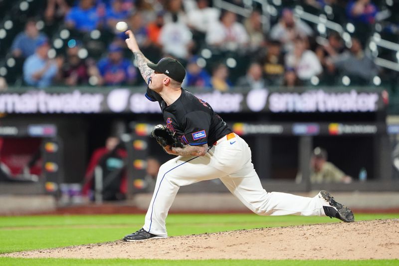 May 31, 2024; New York City, New York, USA; New York Mets pitcher Sean Reid-Foley (71) delivers a pitch against the Arizona Diamondbacks during the ninth inning at Citi Field. Mandatory Credit: Gregory Fisher-USA TODAY Sports