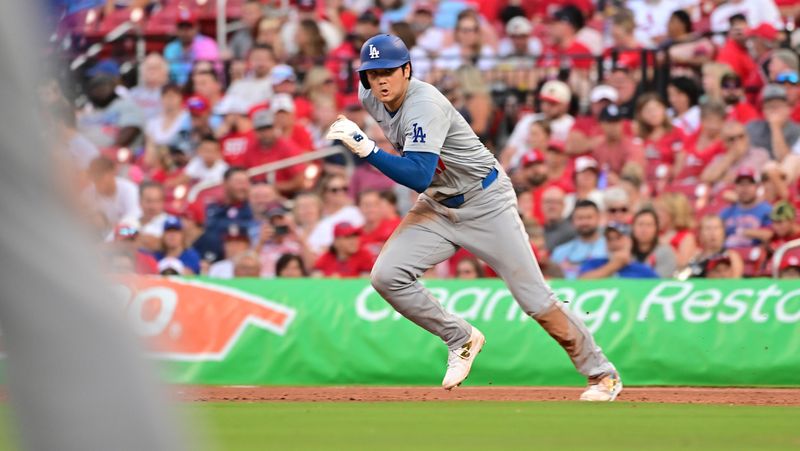 Aug 17, 2024; St. Louis, Missouri, USA; Los Angeles Dodgers two-way player Shohei Ohtani (17) steals second base against the St. Louis Cardinals in the second inning at Busch Stadium. Mandatory Credit: Tim Vizer-USA TODAY Sports