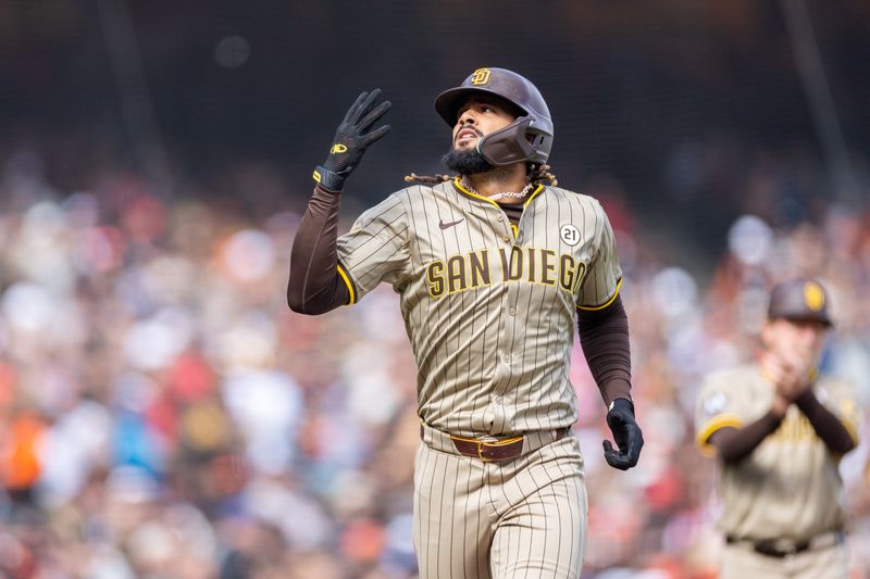 Sep 15, 2024; San Francisco, California, USA; San Diego Padres outfielder Fernando Tatis, Jr. (21) celebrates his solo home run during the eighth inning against the San Francisco Giants at Oracle Park. Mandatory Credit: Bob Kupbens-Imagn Images