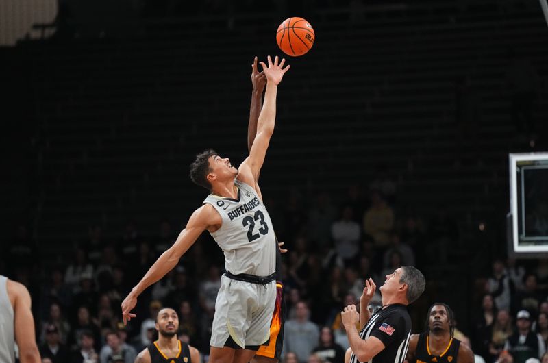 Feb 8, 2024; Boulder, Colorado, USA; Colorado Buffaloes forward Tristan da Silva (23) and Arizona State Sun Devils forward Alonzo Gaffney (8) reach for the tip off in the first half at the CU Events Center. Mandatory Credit: Ron Chenoy-USA TODAY Sports