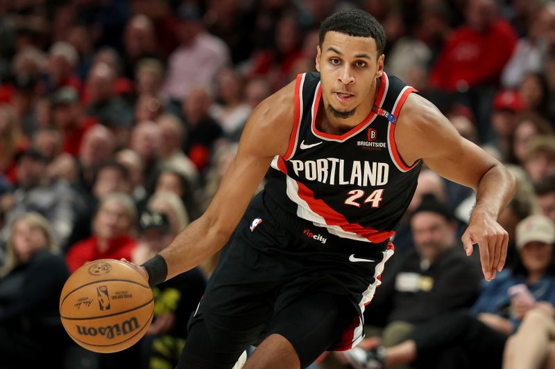 PORTLAND, OREGON - JANUARY 14: Kris Murray #24 of the Portland Trail Blazers dribbles against the Brooklyn Nets \d1hat Moda Center on January 14, 2025 in Portland, Oregon. NOTE TO USER: User expressly acknowledges and agrees that, by downloading and or using this photograph, User is consenting to the terms and conditions of the Getty Images License Agreement. (Photo by Steph Chambers/Getty Images)