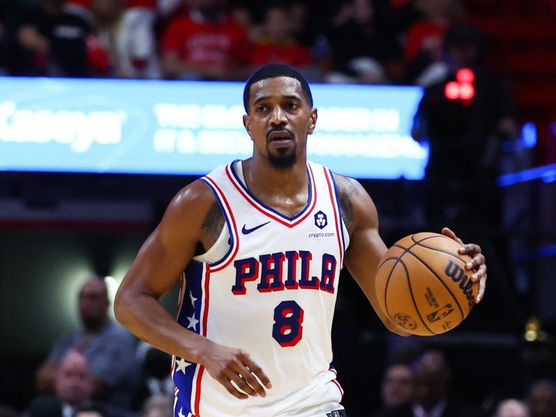 MIAMI, FLORIDA - DECEMBER 25: De'Anthony Melton #8 of the Philadelphia 76ers dribbles the ball against the Miami Heat during the first quarter of the game at Kaseya Center on December 25, 2023 in Miami, Florida. NOTE TO USER: User expressly acknowledges and agrees that, by downloading and or using this photograph, User is consenting to the terms and conditions of the Getty Images License Agreement. (Photo by Megan Briggs/Getty Images)