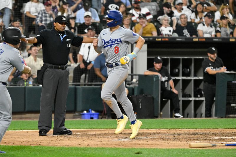 Jun 24, 2024; Chicago, Illinois, USA;  Los Angeles Dodgers third base Enrique Hernández (8) scores against the Chicago White Sox during the seventh inning at Guaranteed Rate Field. Mandatory Credit: Matt Marton-USA TODAY Sports