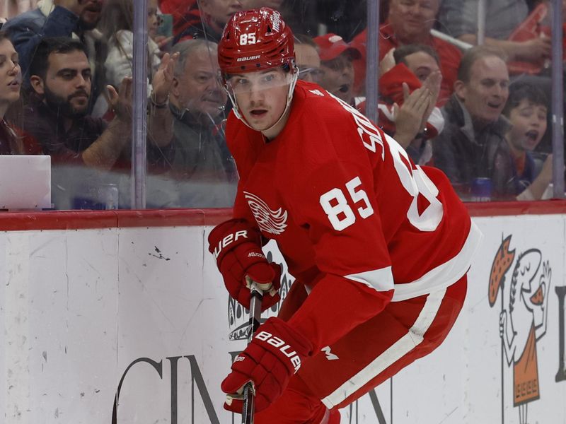 Nov 5, 2022; Detroit, Michigan, USA;  Detroit Red Wings left wing Elmer Soderblom (85) skates with the puck in the second period against the New York Islanders at Little Caesars Arena. Mandatory Credit: Rick Osentoski-USA TODAY Sports