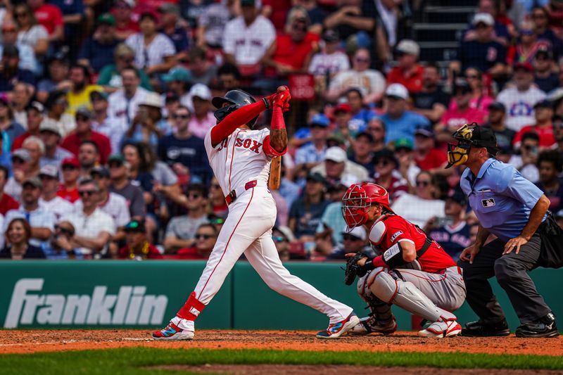 Jun 4, 2025; Boston, Massachusetts, USA; Boston Red Sox outfielder Ceddanne Rafaela (3) hits a game winning home run against the Los Angeles Angels in the ninth inning at Fenway Park. Mandatory Credit: David Butler II-Imagn Images