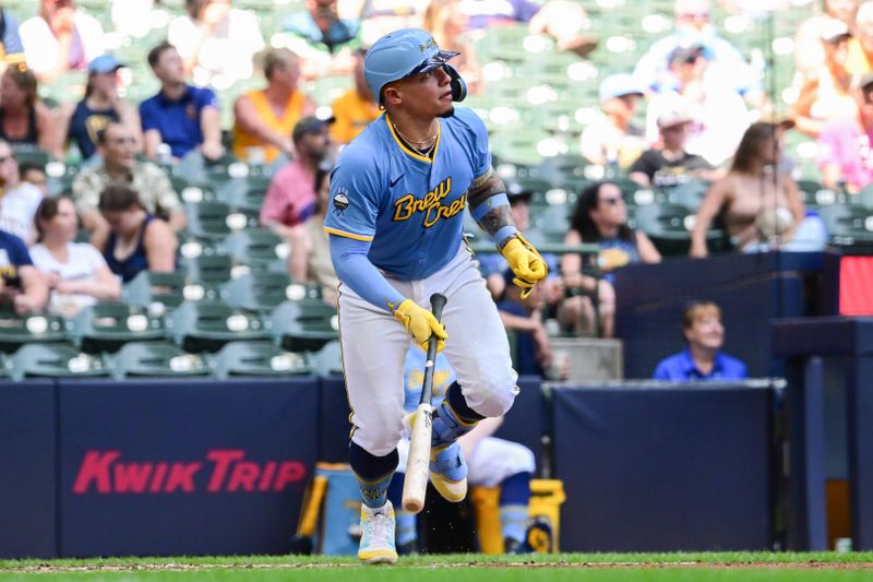 Jul 14, 2024; Milwaukee, Wisconsin, USA; Milwaukee Brewers catcher William Contreras (24) watches after hitting a solo home run in the third inning against the Washington Nationals at American Family Field. Mandatory Credit: Benny Sieu-USA TODAY Sports