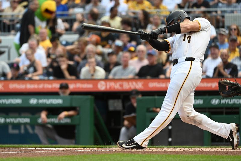 Aug 3, 2024; Pittsburgh, Pennsylvania, USA;  Pittsburgh Pirates batter Joey Bart (14) hits a solo home run against the Arizona Diamondbacks in the second inning at PNC Park. Mandatory Credit: Philip G. Pavely-USA TODAY Sports